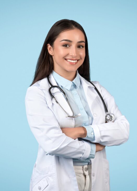 Cheerful doctor with stethoscope posing confidently